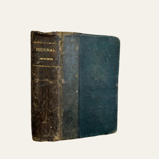 Vintage book titled 'Diéurnal' on a textured surface