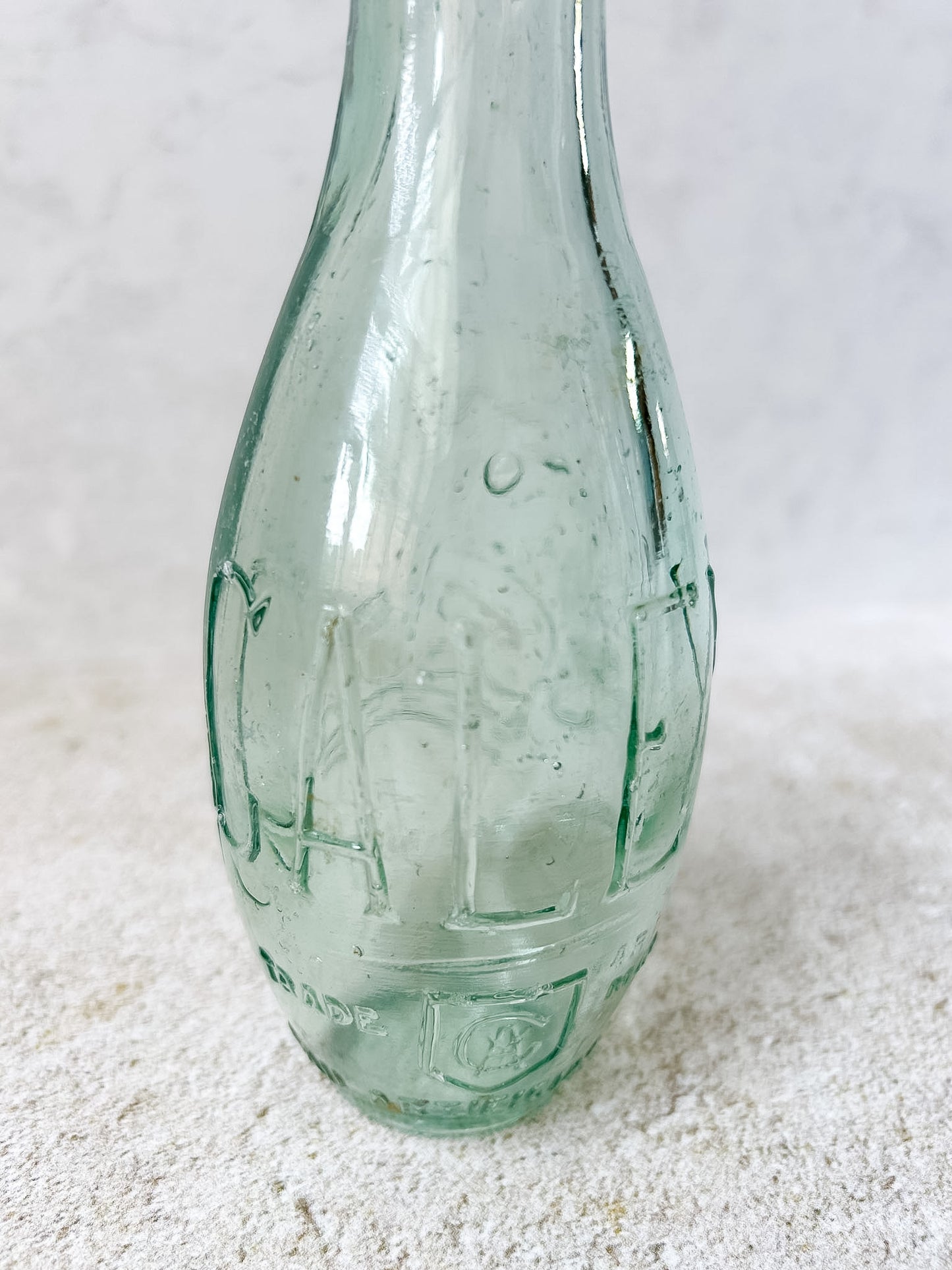 Antique Caley's Embossed Aqua Glass Soda Bottle
