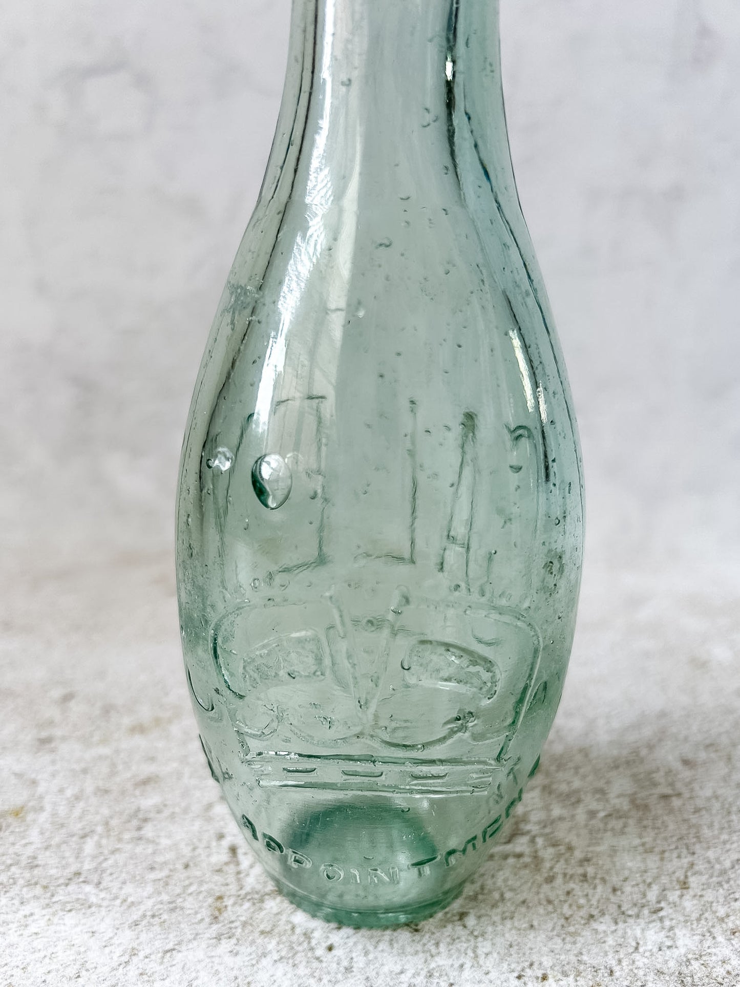 Antique Caley's Embossed Aqua Glass Soda Bottle