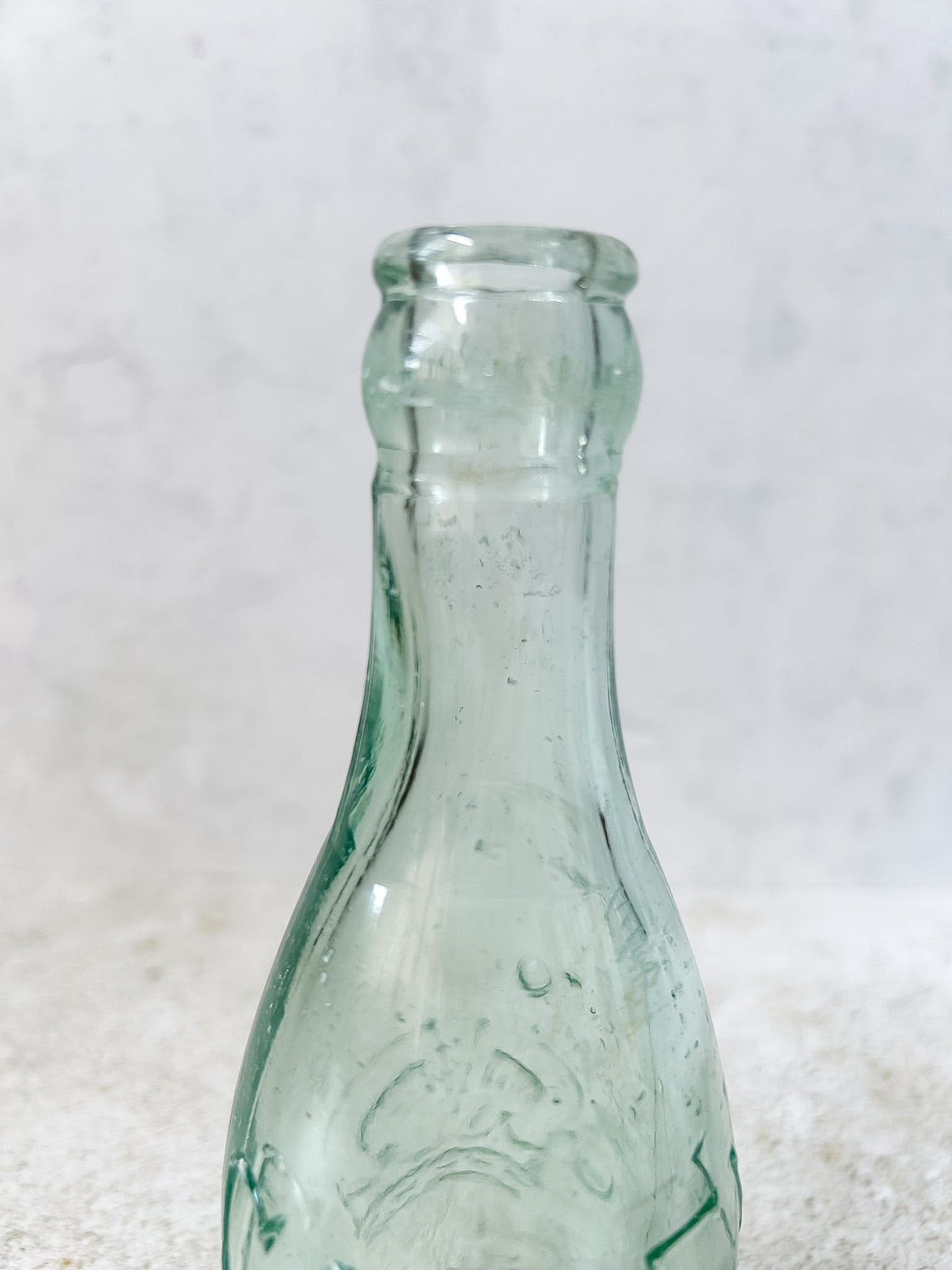 Antique Caley's Embossed Aqua Glass Soda Bottle