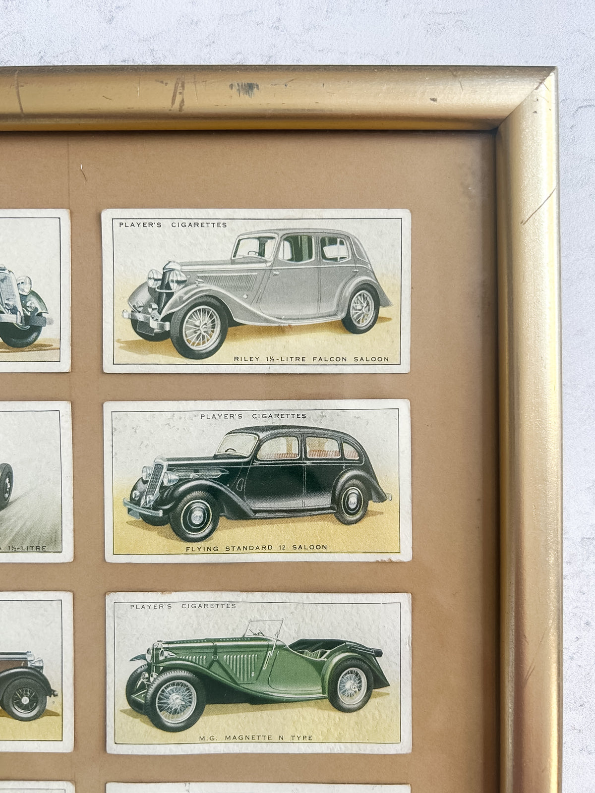 Framed 1936 Player’s Motor Cars Cigarette Cards